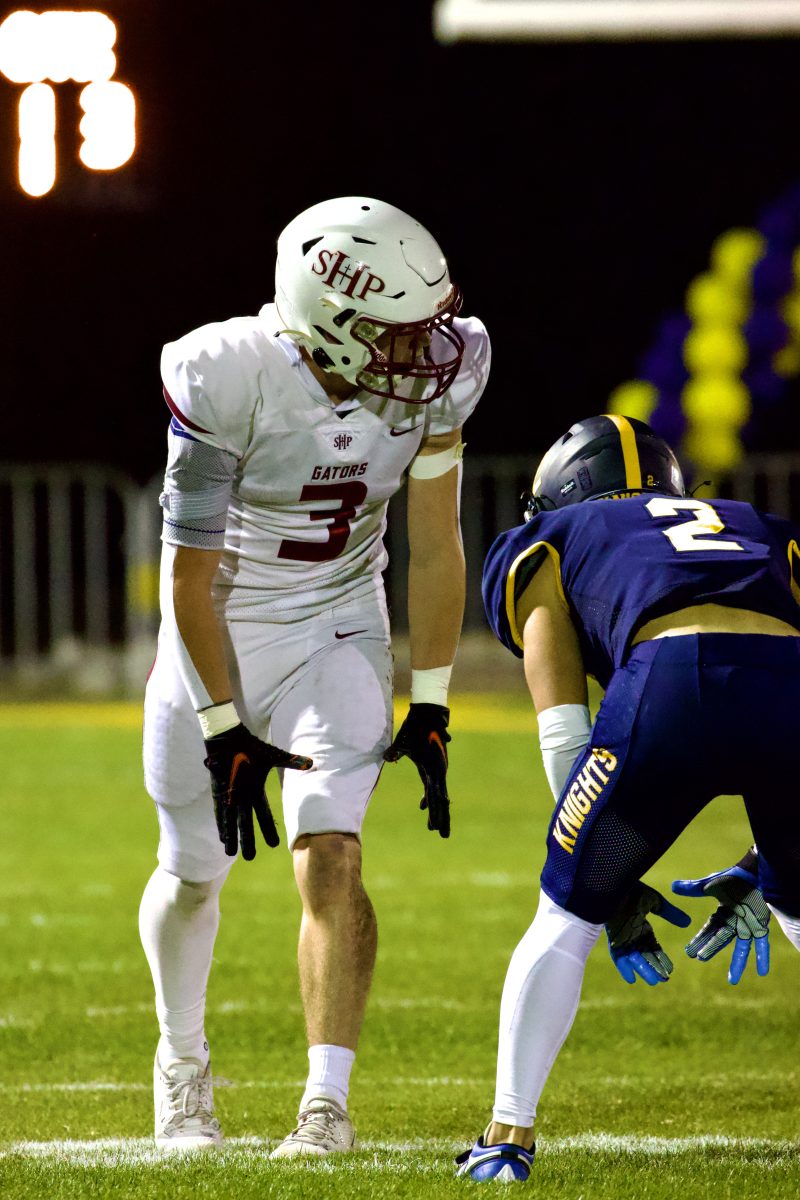 Charlie Stuart '24 lines up at the line of scrimmage at Valpo Bowl.