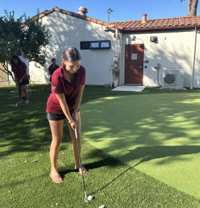 Emily Hallum '26 putts during Girls Varsity Golf Practice.