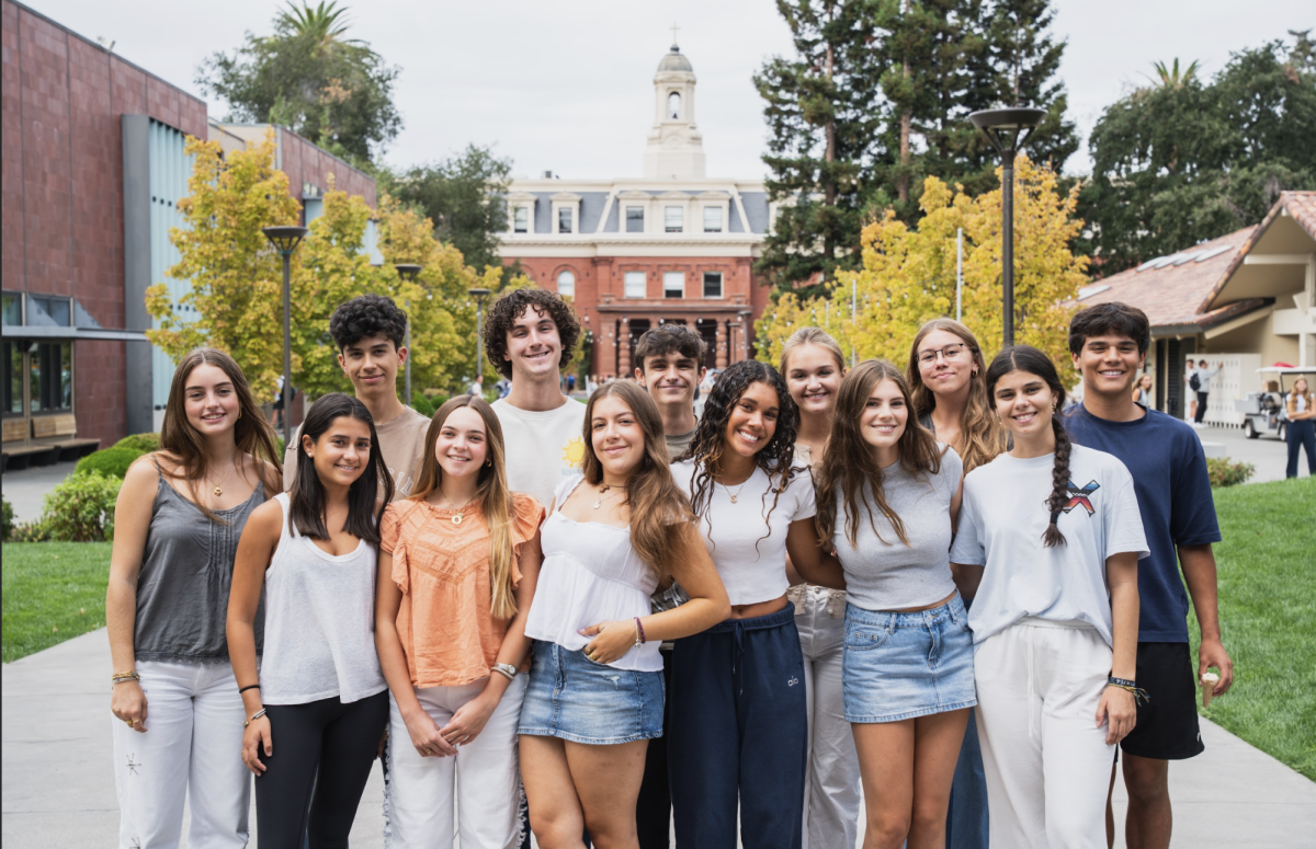 Students from Barcelona, Sevilla, and Madrid pose with their hosts. // Photo Provided by Sean Finnegan.