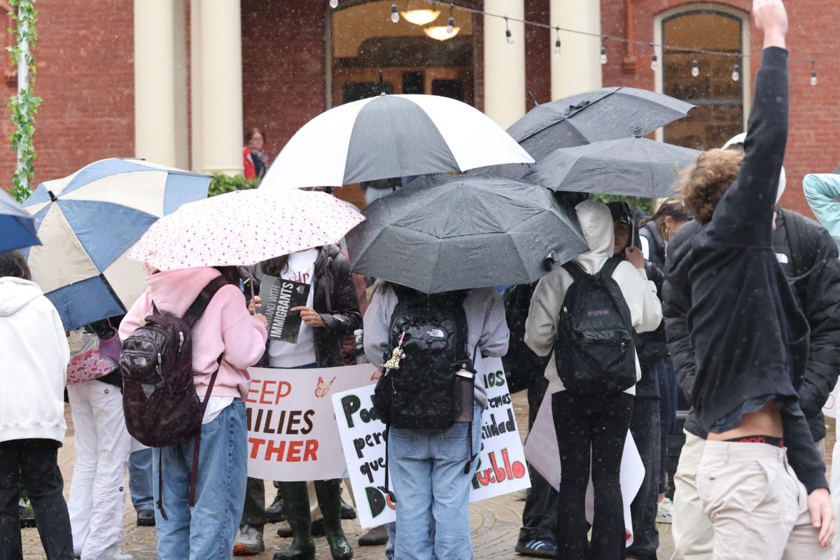 Students gather in Spring 2025 for a walkout over Trump's immigration policies.
