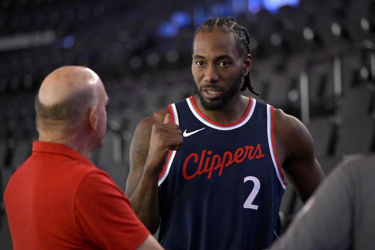 Sep 30, 2024; Inglewood, CA, USA;  Los Angeles Clippers forward Kawhi Leonard (2) talks with team owner Steve Ballmer during media day at Intuit Dome. Mandatory Credit: Jayne Kamin-Oncea-Imagn Images/File photo