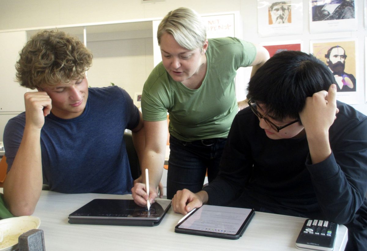 David Edelman ‘26 and Mark Shen ‘27 receiving math help from Ms.York.