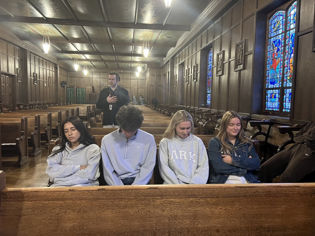 Seniors Karen Martinez, Jackson Loftus, Talia Samuels and Jenna Botto meditate in Mr. Lorentz's Prayer and Meditation class.