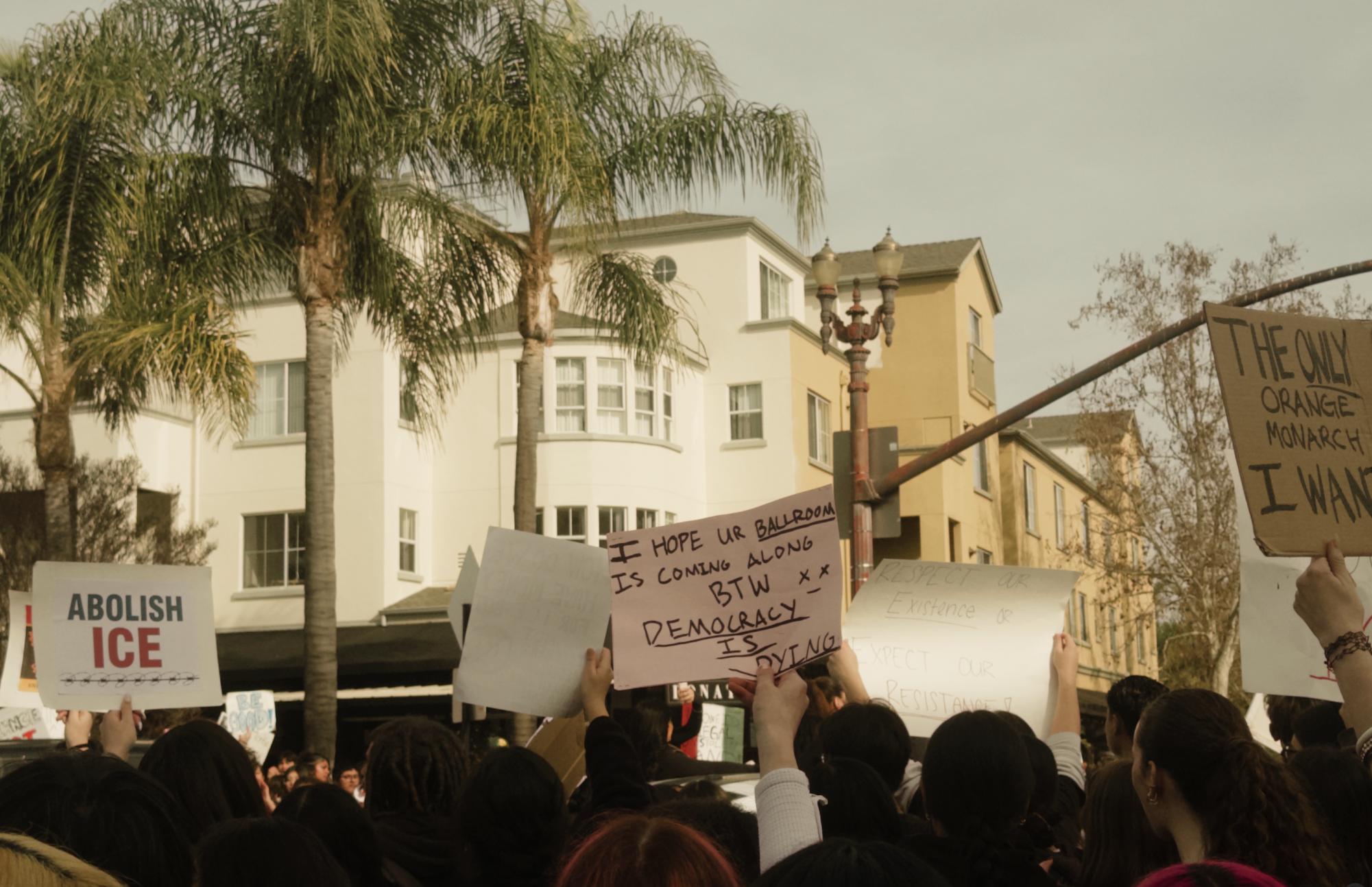 Student protestors in Redwood City hold up signs criticizing ICE and the Trump administration on January 30th.