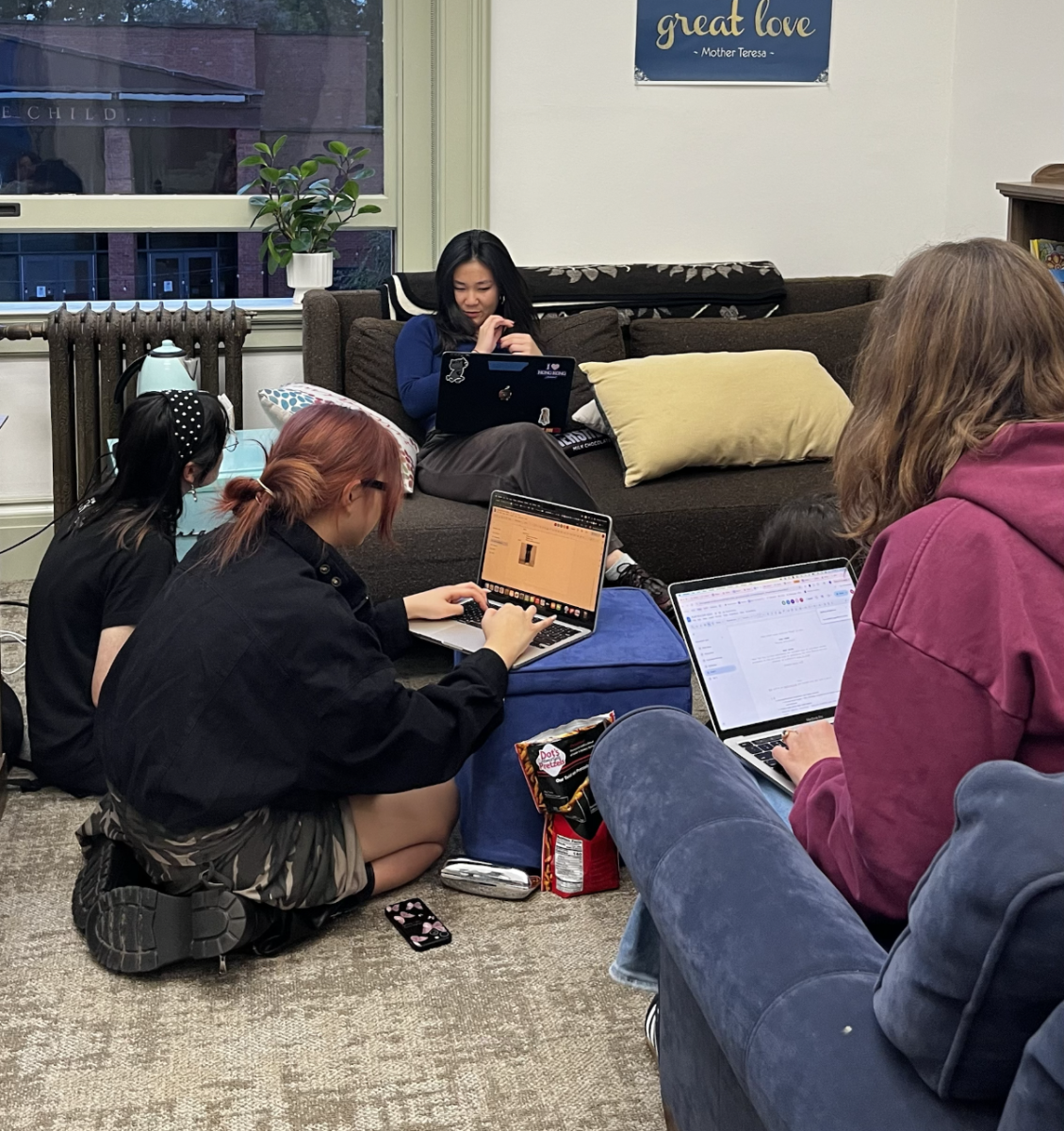 Play in a day writers work on their scripts // Provided by Sloane Smith '27